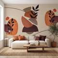Krem kanepe ve hasır halılı modern salonda boho soyut botanik yaprak ve geometrik form desenli sıcak toprak tonlarında odak duvar kağıdı